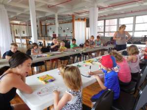 LArge group of kids learning at WIAC summer art camp